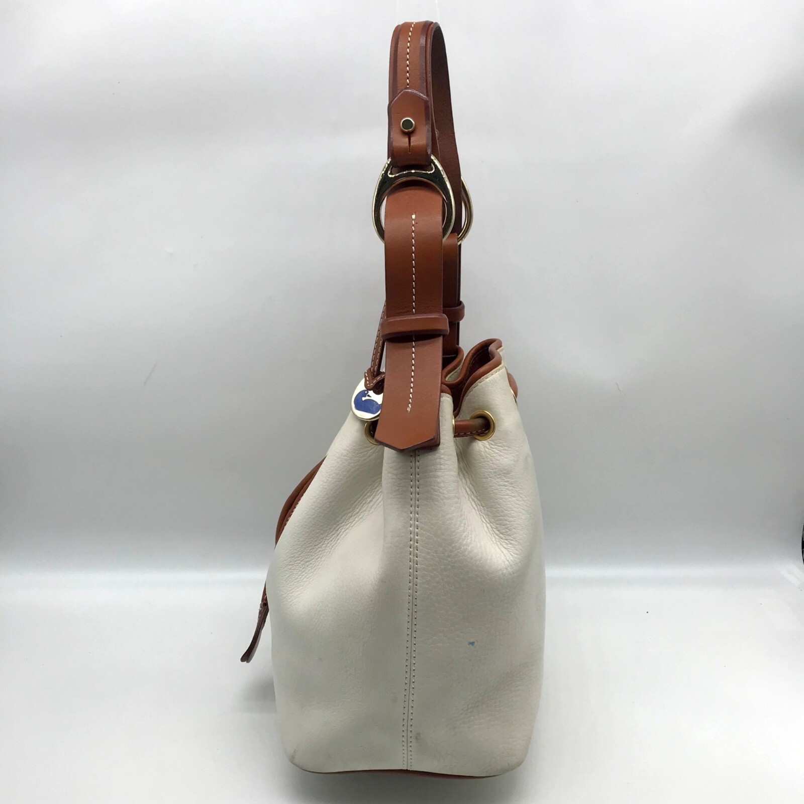 Dooney & Bourke Ivory & Brown Vintage Drawstring Shoulder Bag