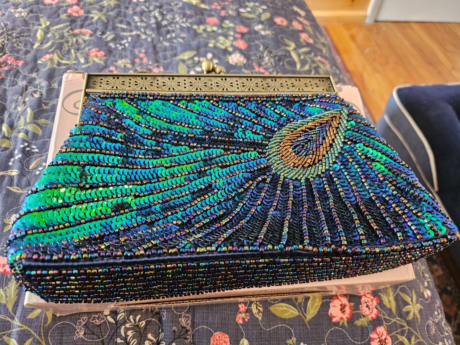 New Uborse sequined peacock clutch