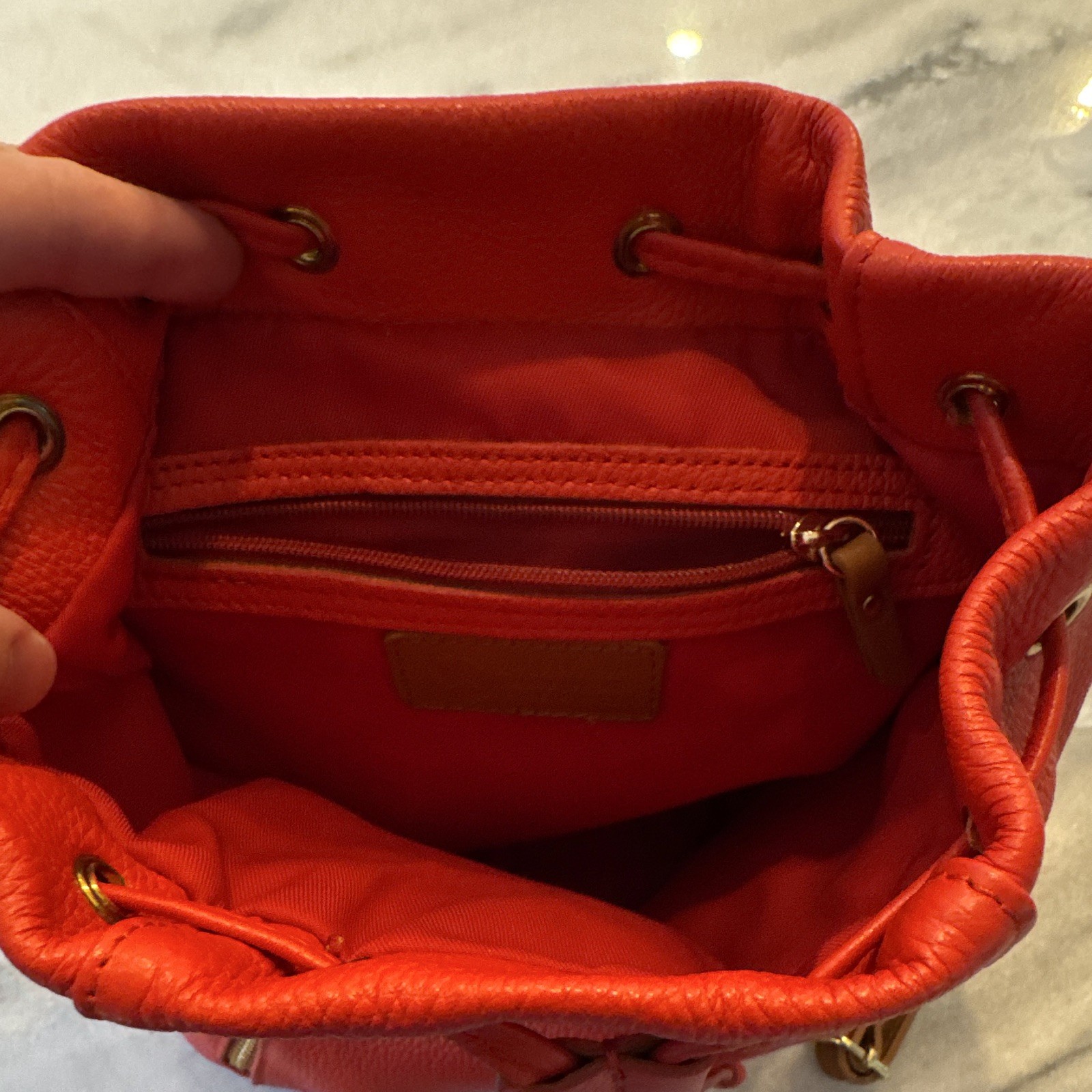 Valentina Medium Red Pebbled Drawstring Backpack Brown Straps Gold Hardware