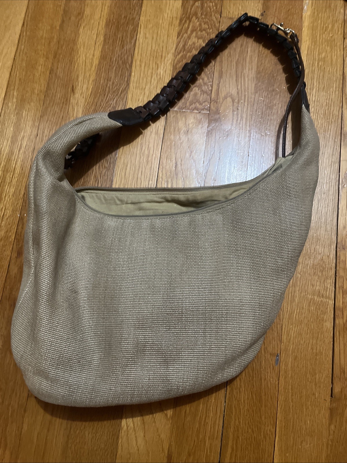 This beige, textured canvas purse from the Essentials brand