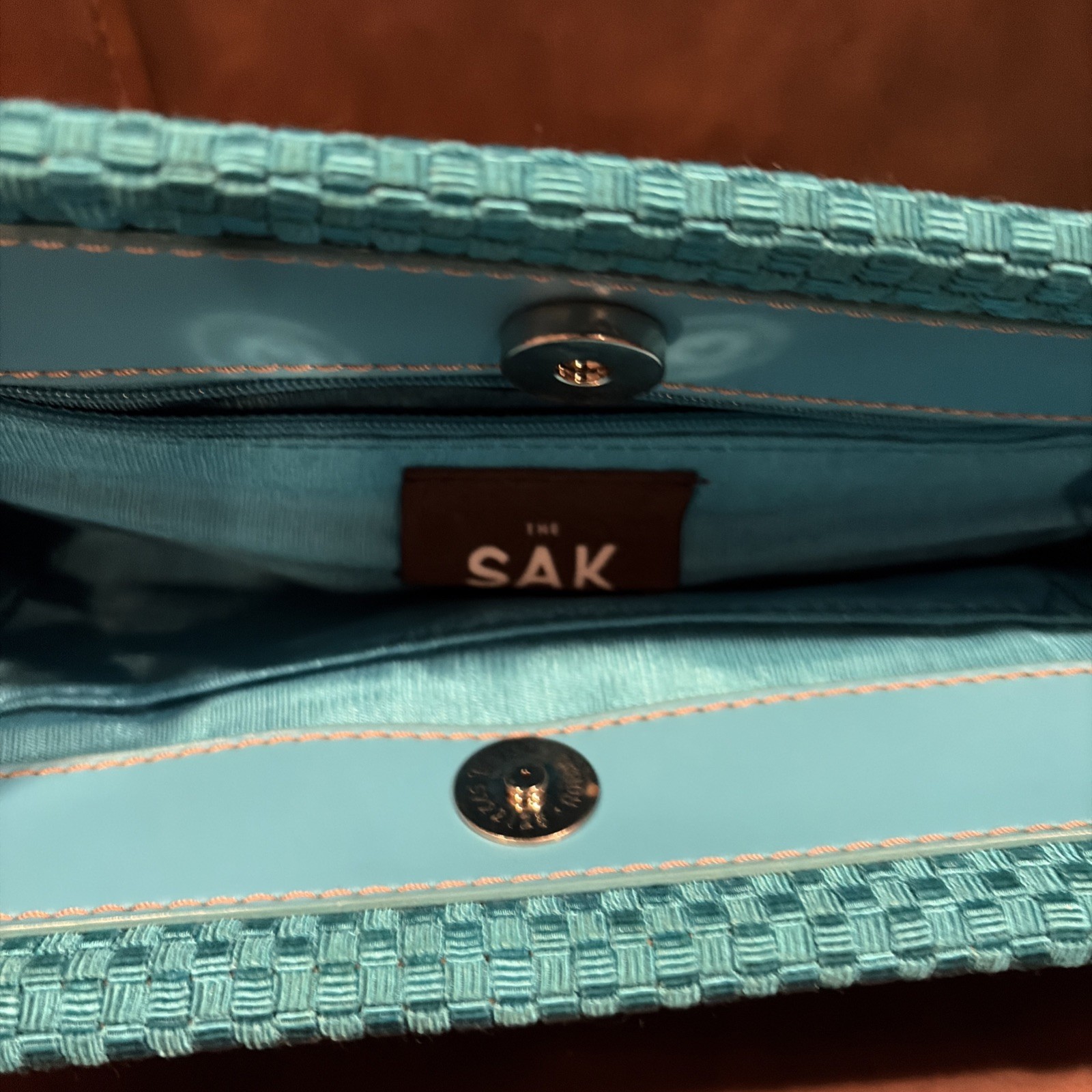 The Sak Mini Shoulder Bag woven w vegan leather trim turquoise heart