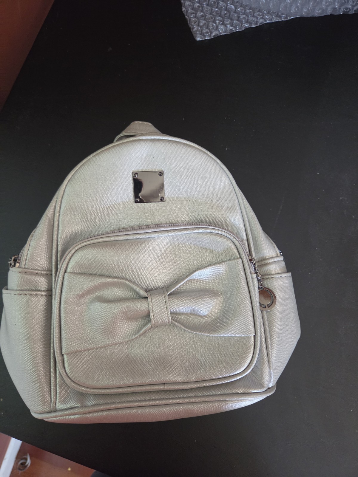 Silver Metallic Mini Backpack Purse Bow Accent Zip Adjustable Strap