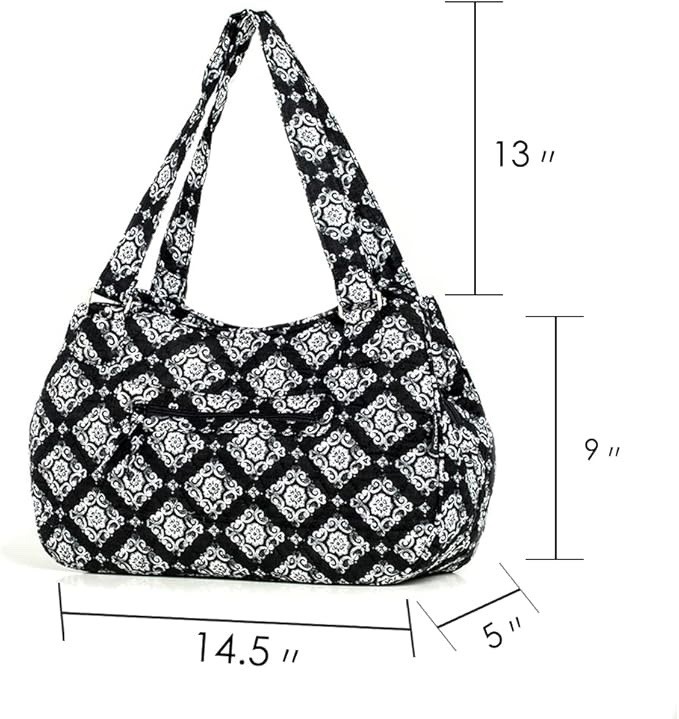 MAGOU quilted cotton tote shoulder bag in a black and white floral pattern.