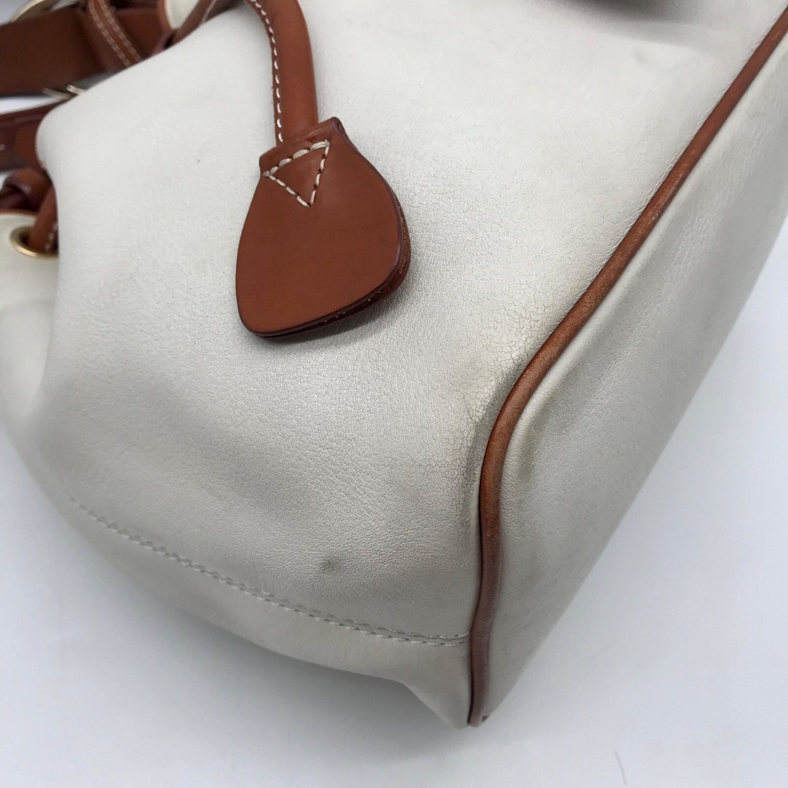 Dooney & Bourke Ivory & Brown Vintage Drawstring Shoulder Bag