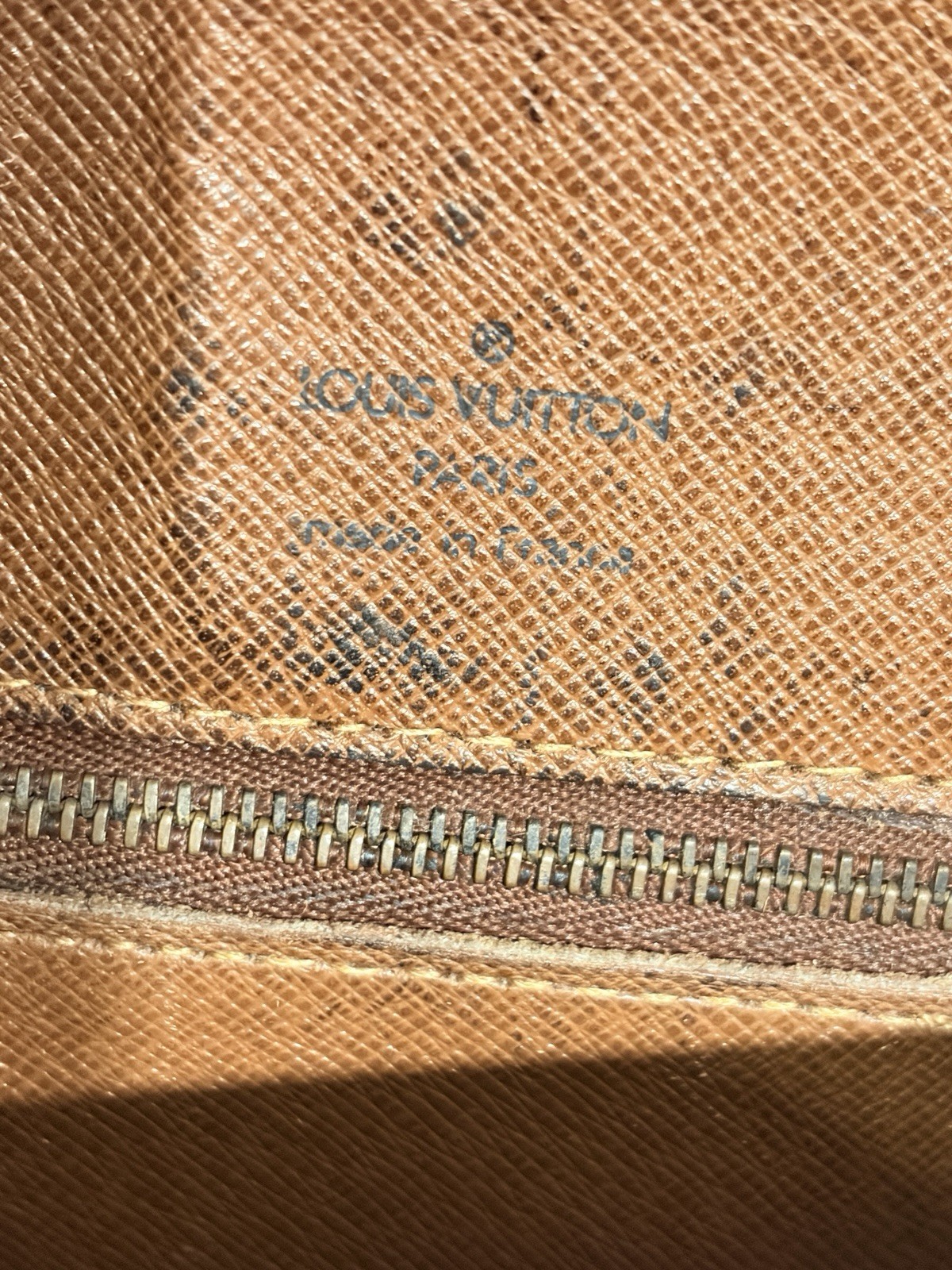 Louis Vuitton St. Cloud GM intricate brown braided leather trim and long fringe