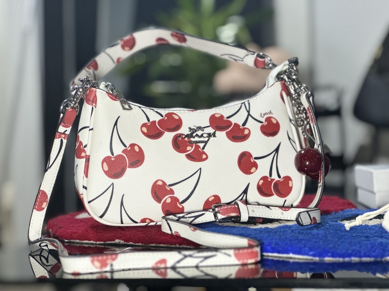 Coach cherry shoulder bag, white and red