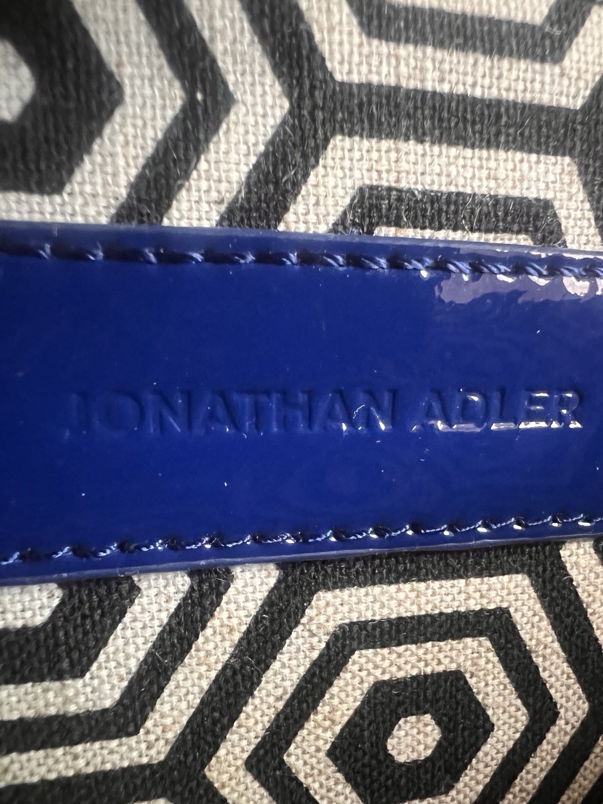 Jonathan Alder red YES clutch purse