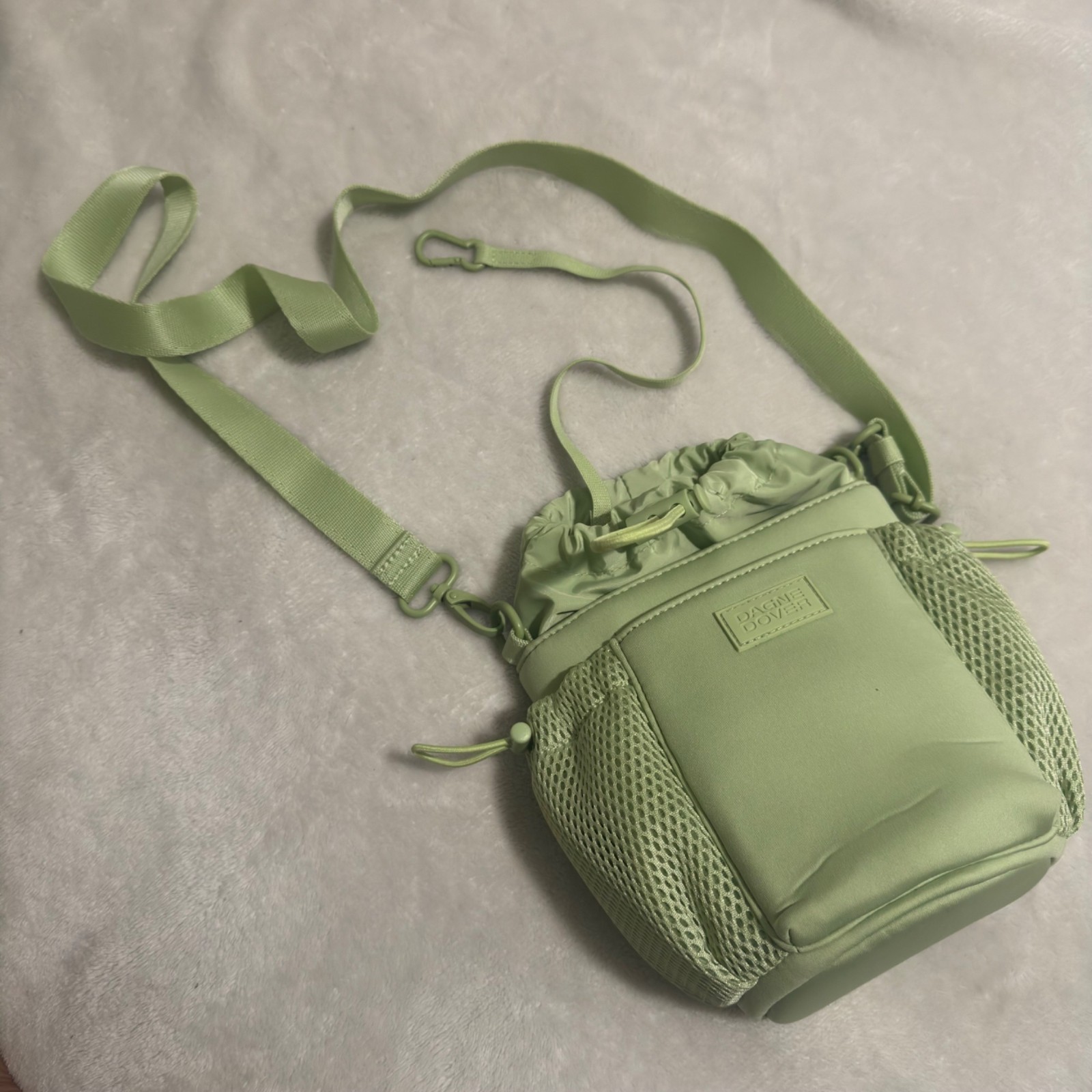 Dagne Dover Sloan Water Bottle Sling In Matcha Latte With Adjustable Strap