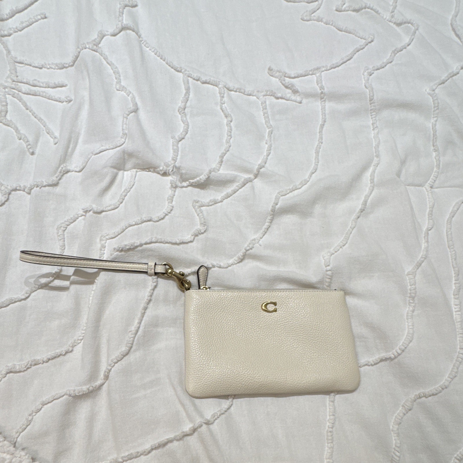 Coach Cream Wristlet with Traditional Pattern Gold Hardware Excellent Condition