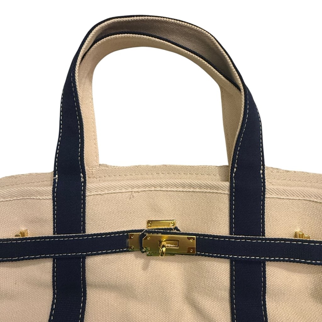 Canvas Boatkin Tote Bag in Natural and Navy with Gold Lock Hardware
