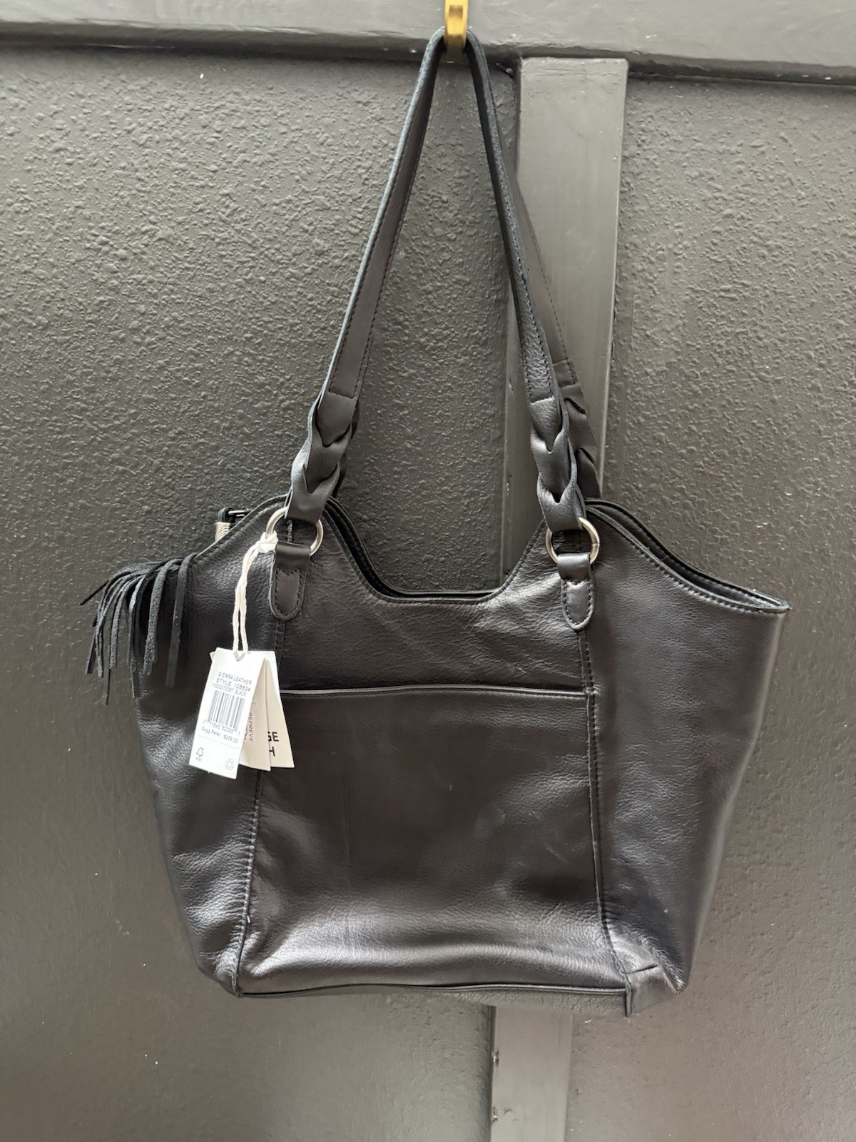 The Sak Black Shoulder Bag Zip Top Fringe Charm Braided Strap Pockets Lined
