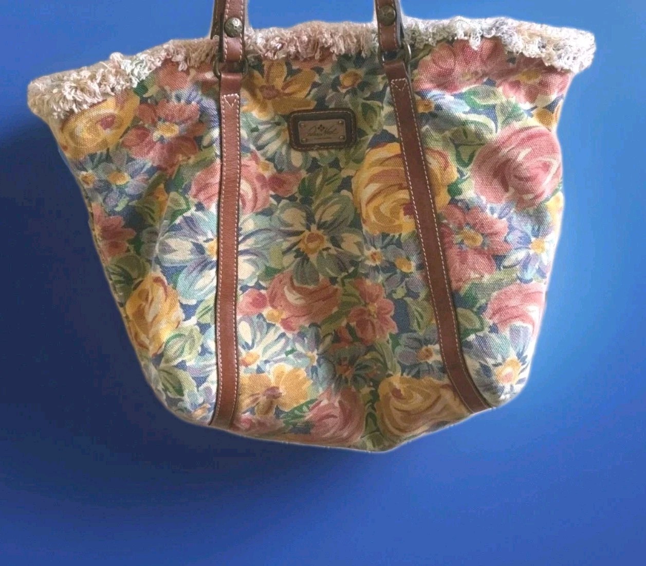 Patricia Nash floral Purse Tote bag. Handle drop is 13 in 17 inches by 15 Read