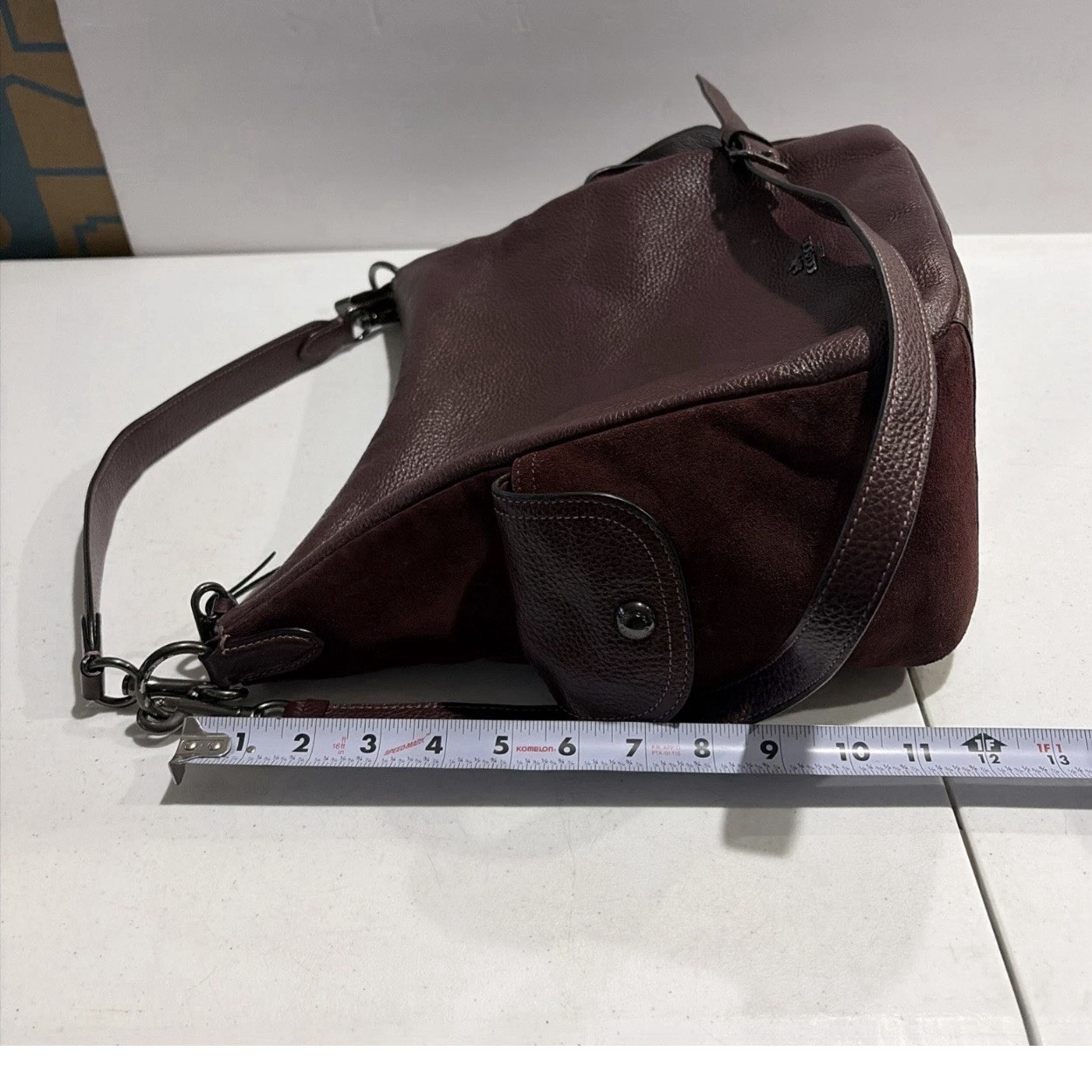 Coach Burgundy Pebbled Shoulder Bag Adjustable Strap Zipper Buckle Accent