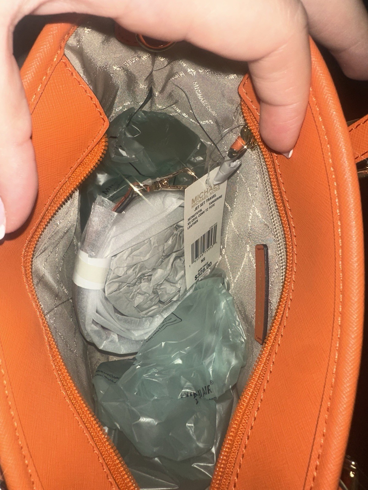 Michael Kors Orange saffiano Tote with MK Logo Charm