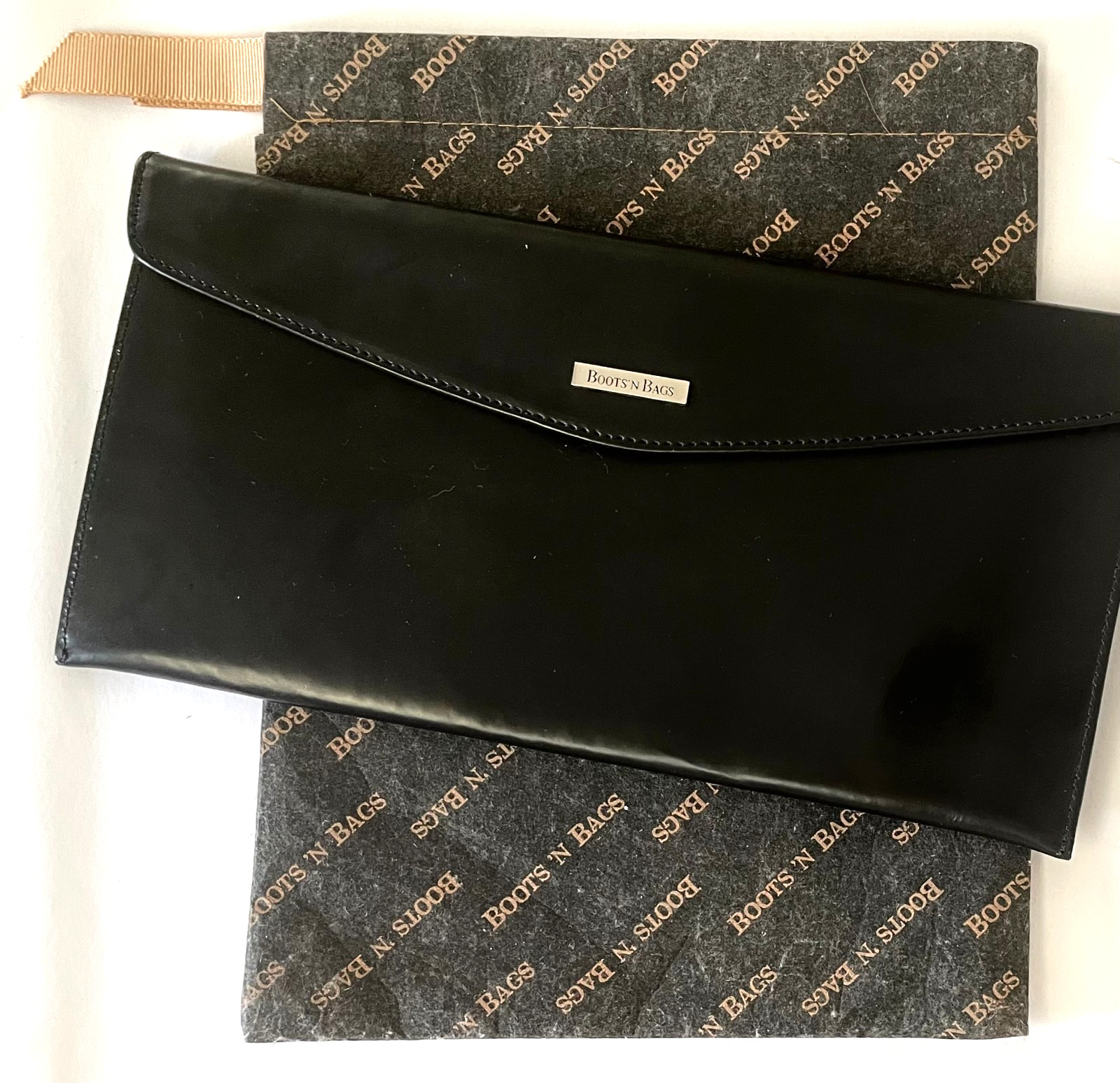 “Boots ‘N Bags” Vintage leather. Envelope, Wallet 2002. 10 1/5″ x 5 1/5″ black