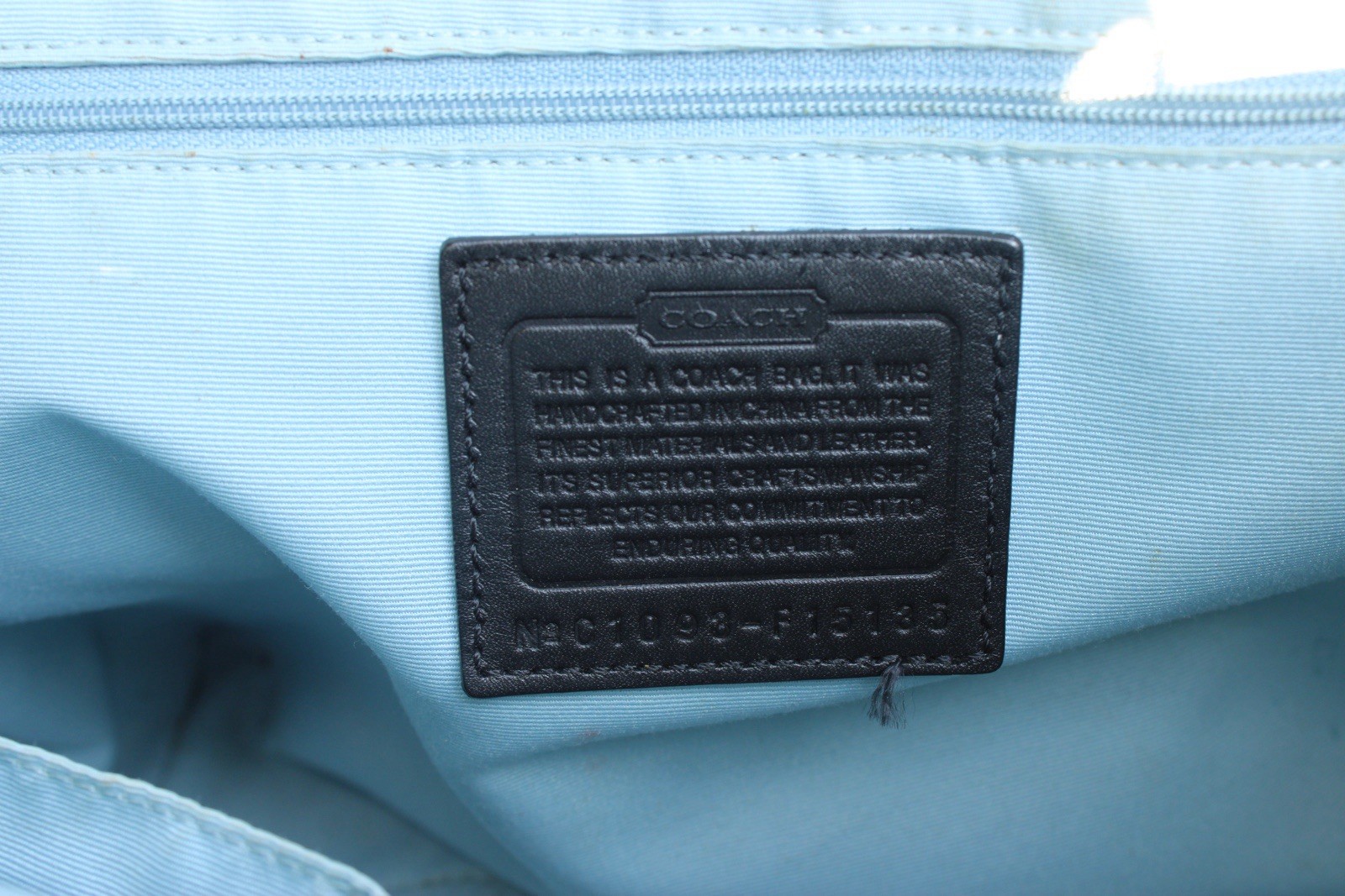 2000s Coach Black/White Op Art tote with silver turn-lock front pocket