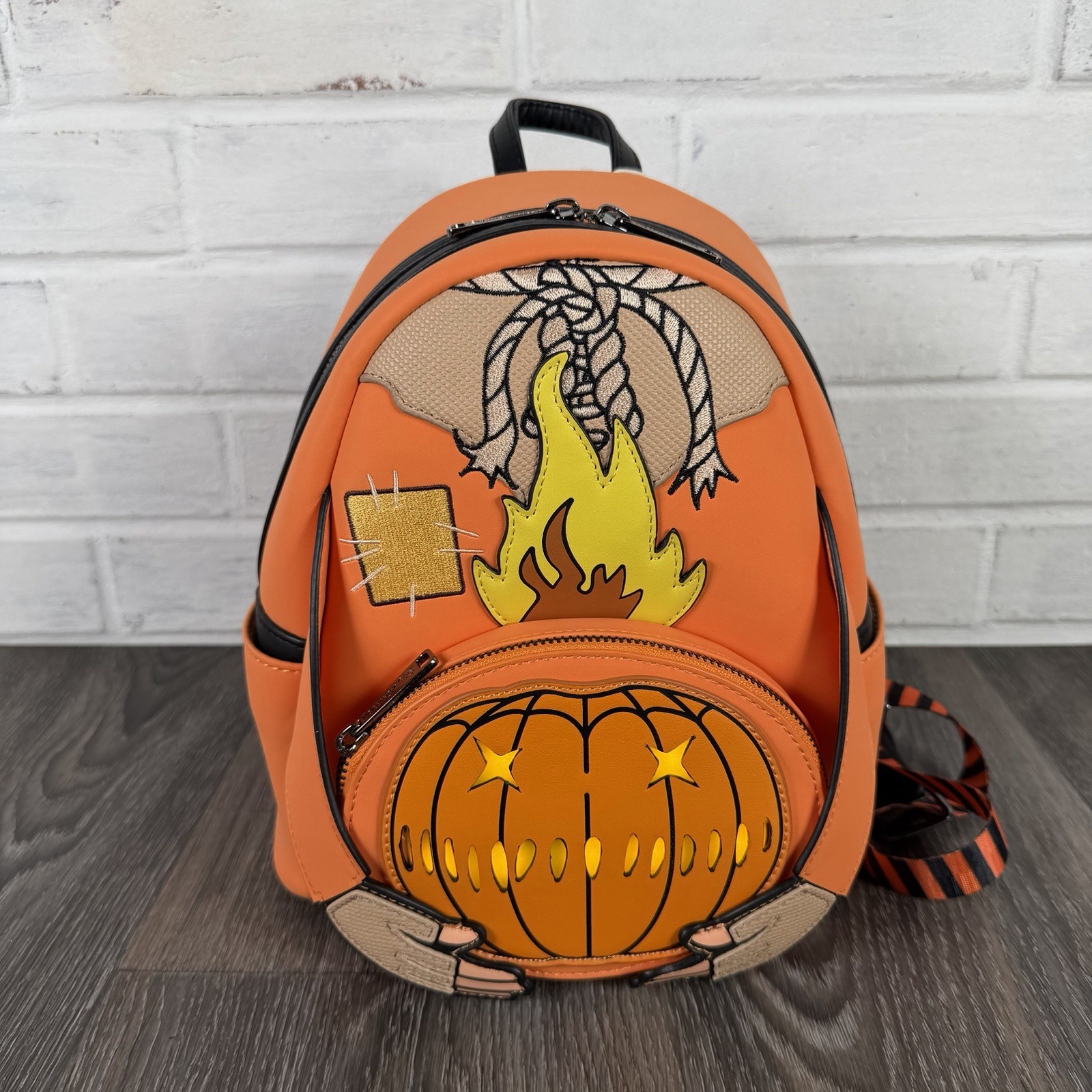 Loungefly Trick ‘R Treat Flaming Pumpkin Head Sam Light Up Glow Mini Backpack