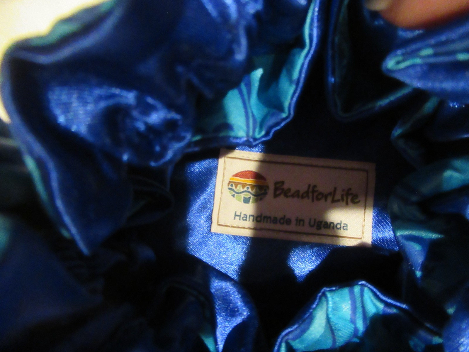 Bead for Life blue drawstring bag, handmade in Uganda