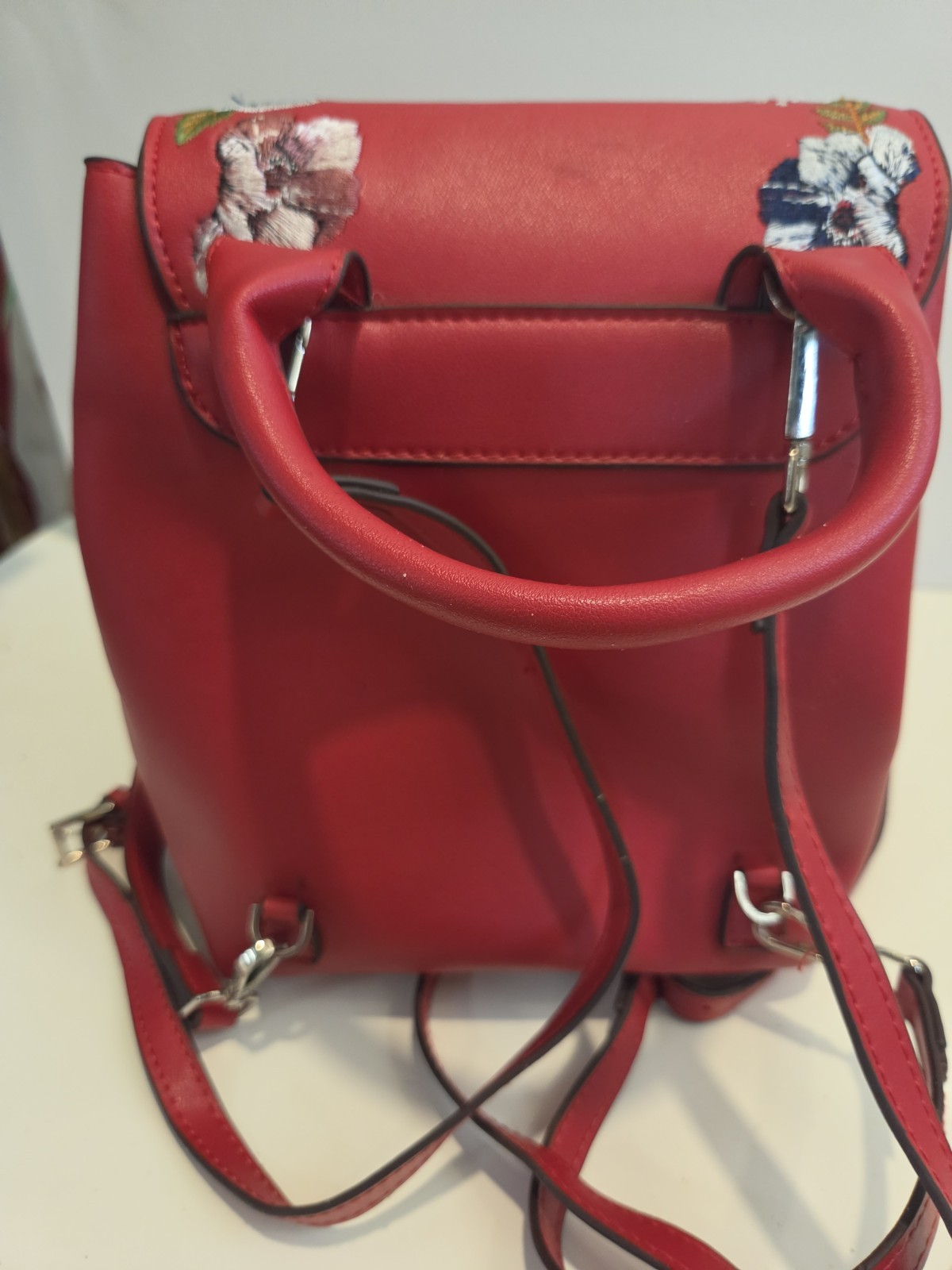 CHARLES & KEITH Women’s Red Floral Embroidered Backpack Drawstring Silver