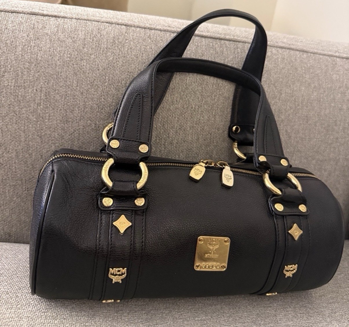 MCM Black Pebbled Cylinder Satchel Top Handle Bag Zip Closure Gold HW Red Lining