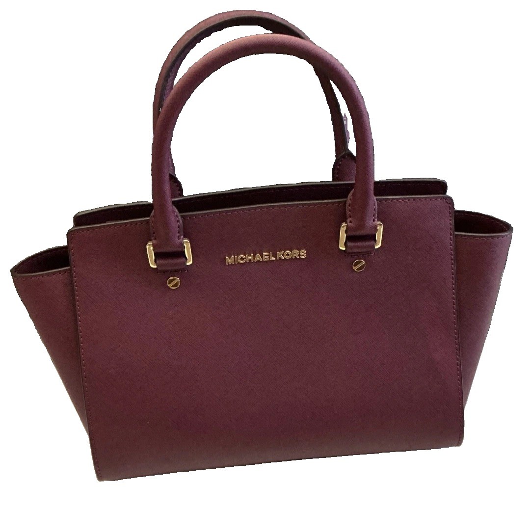 Michael kors Selma leather bag Plum Color Slightly Used