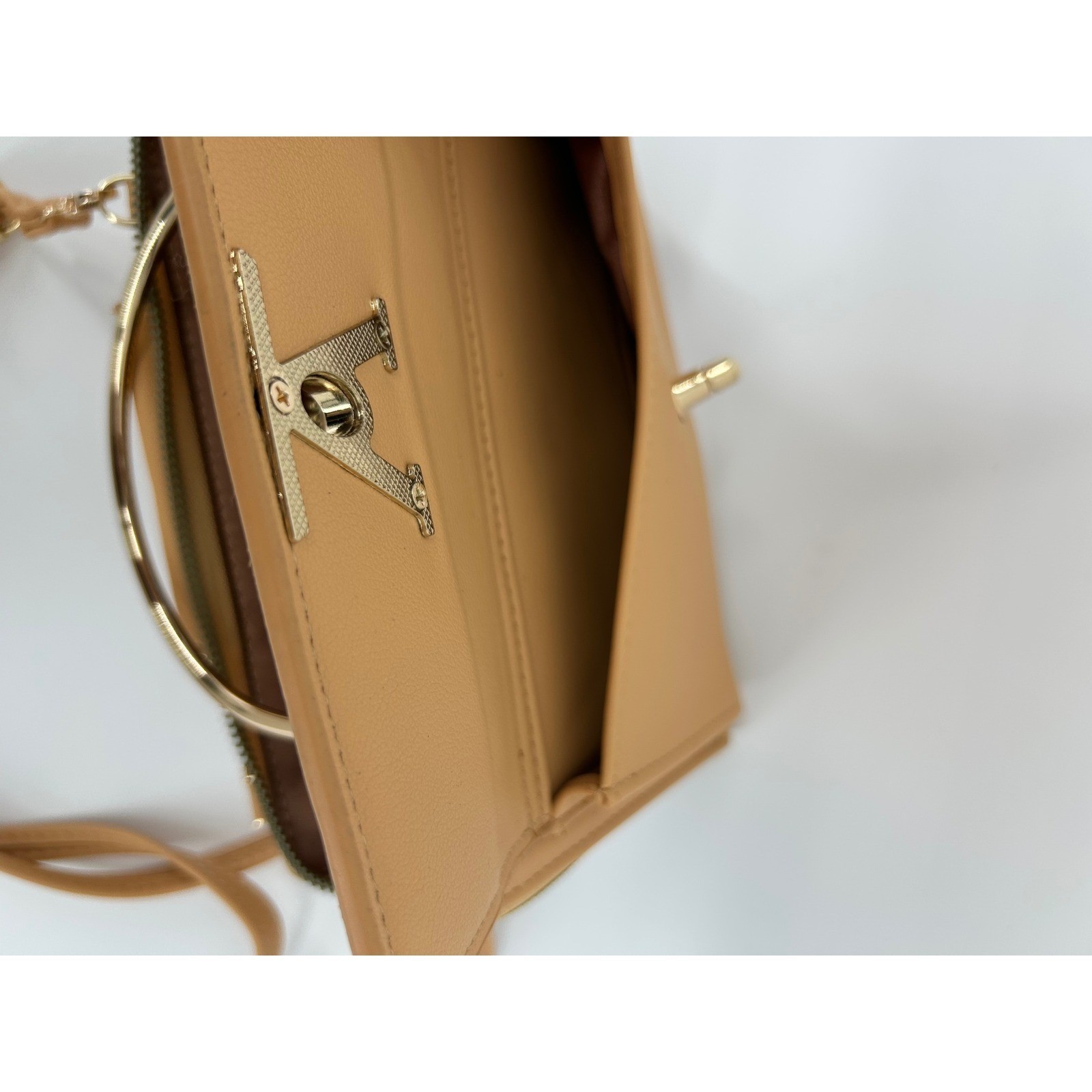 Tan Vegan Leather Crossbody Bag with Gold Ring Handle and V Turn-Lock Clasp
