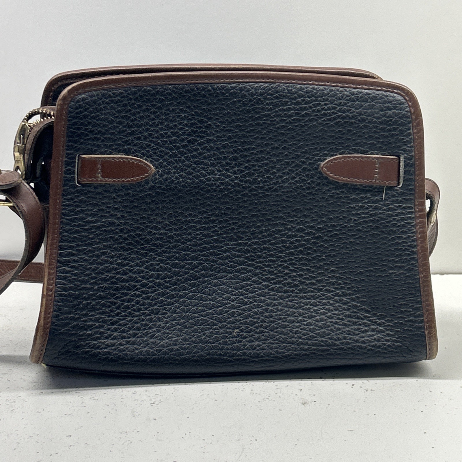Dooney & Bourke VTG Pebbled Leather Black & British Tan Buckle Zip Crossbody Bag