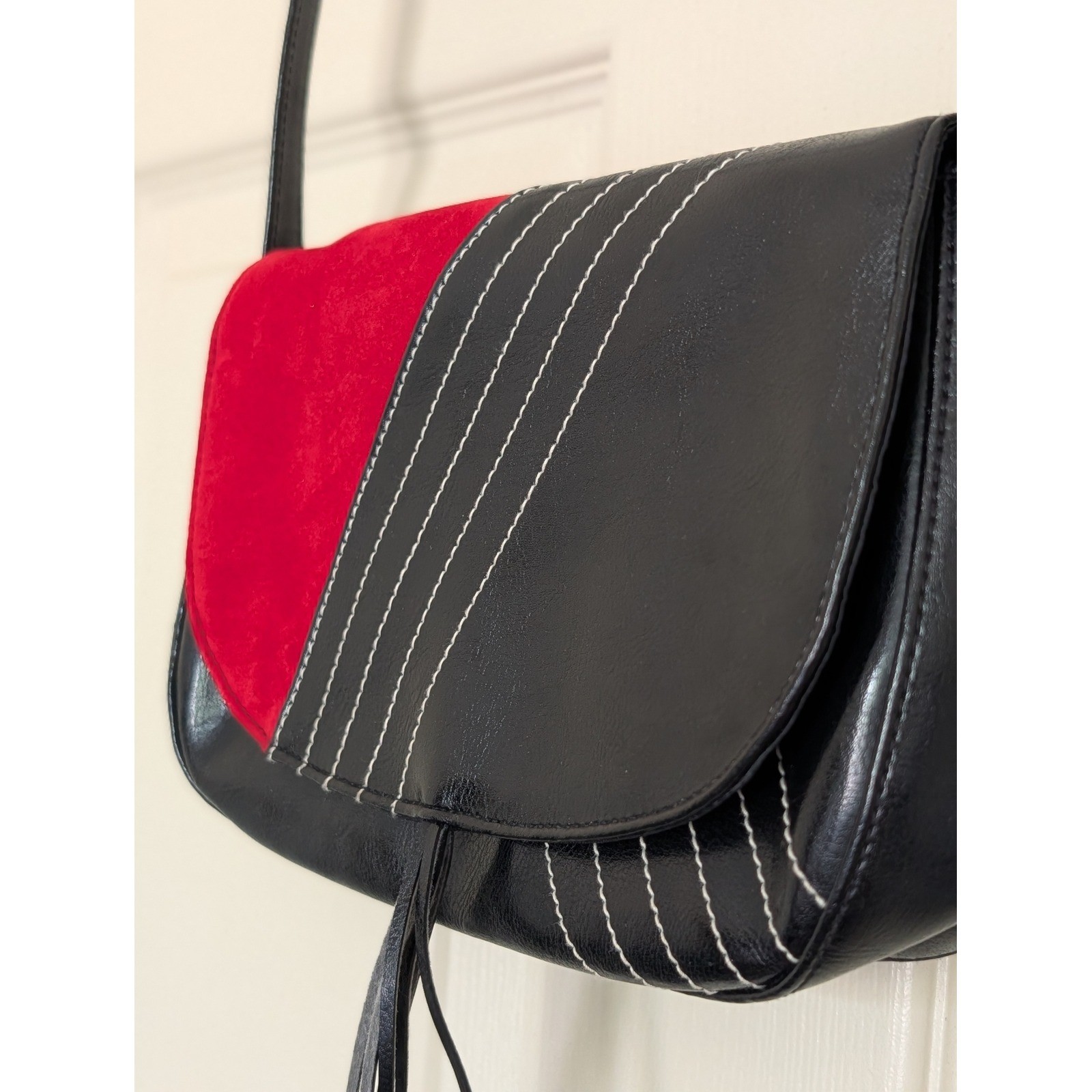 Victorias Secret Black Red Colorblock Faux Leather Suede Tassel purse.