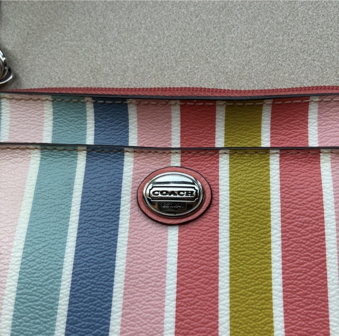 Coach Multicolor Striped Zip Wristlet Clutch. Peyton
