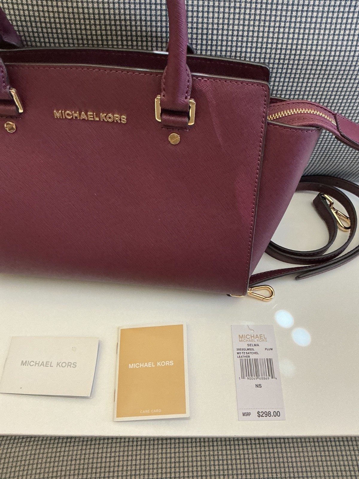 Michael kors Selma leather bag Plum Color Slightly Used