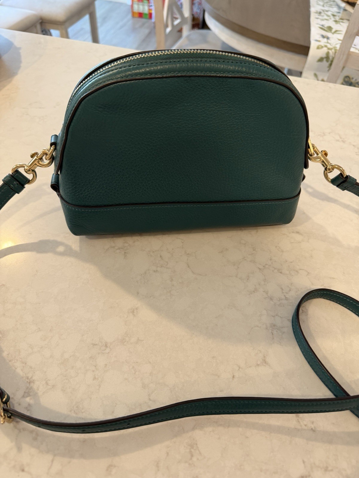 Coach teal Pebbled Leather Crossbody With Gold Studded Script Logo