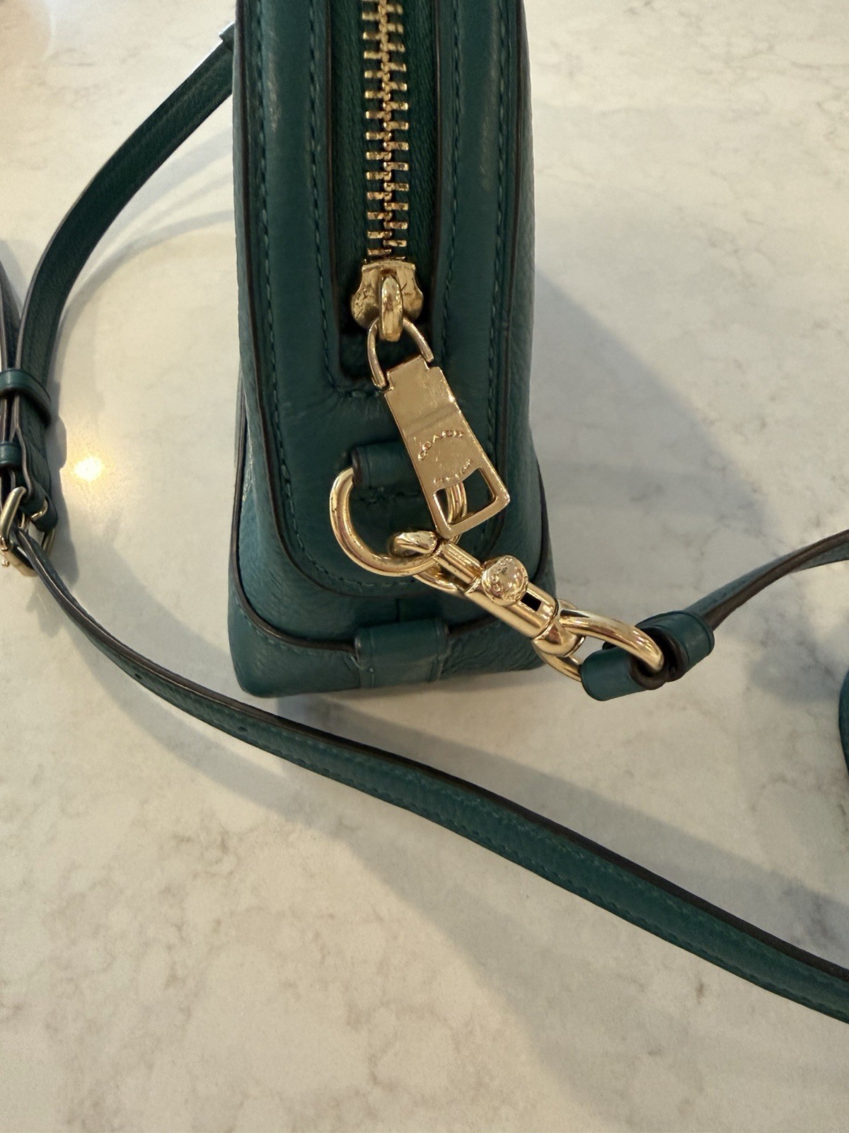 Coach teal Pebbled Leather Crossbody With Gold Studded Script Logo