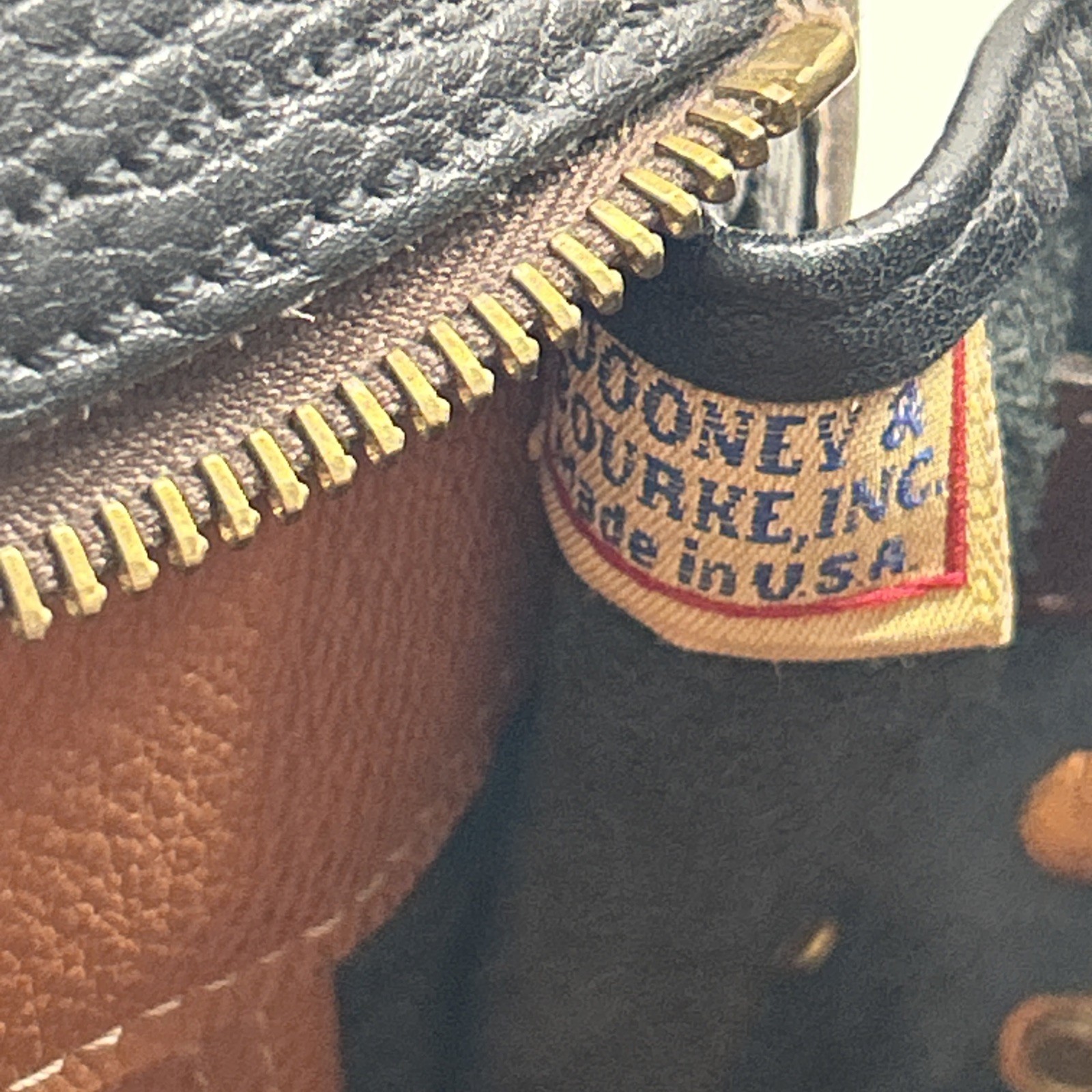 Dooney & Bourke VTG Pebbled Leather Black & British Tan Buckle Zip Crossbody Bag