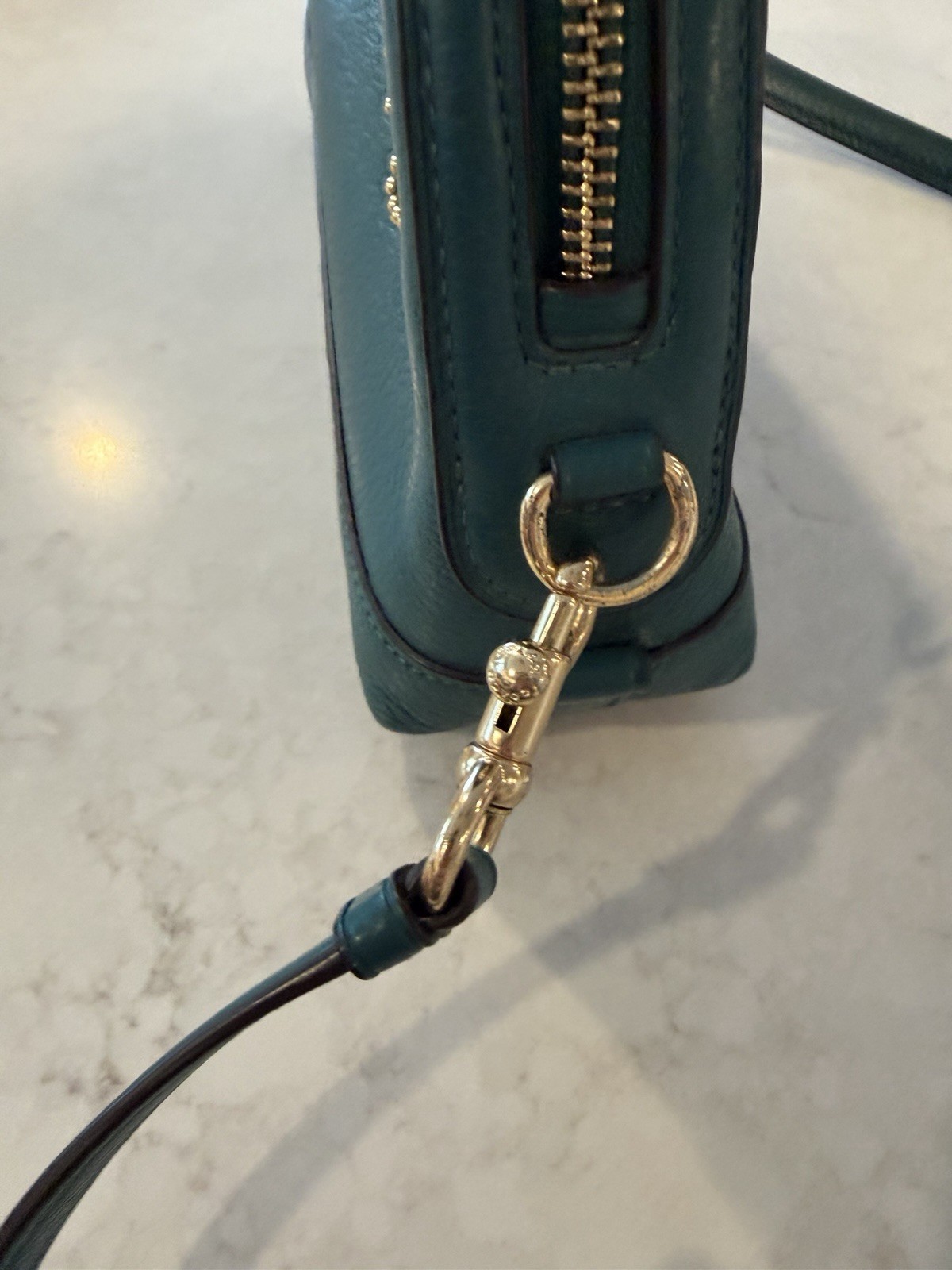 Coach teal Pebbled Leather Crossbody With Gold Studded Script Logo
