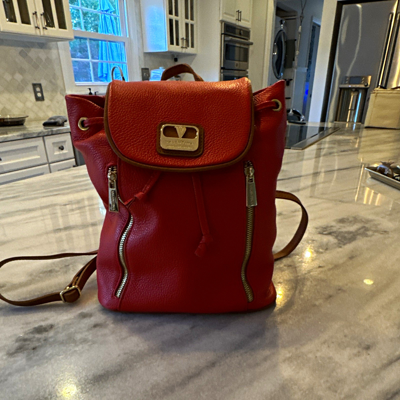 Valentina Medium Red Pebbled Drawstring Backpack Brown Straps Gold Hardware