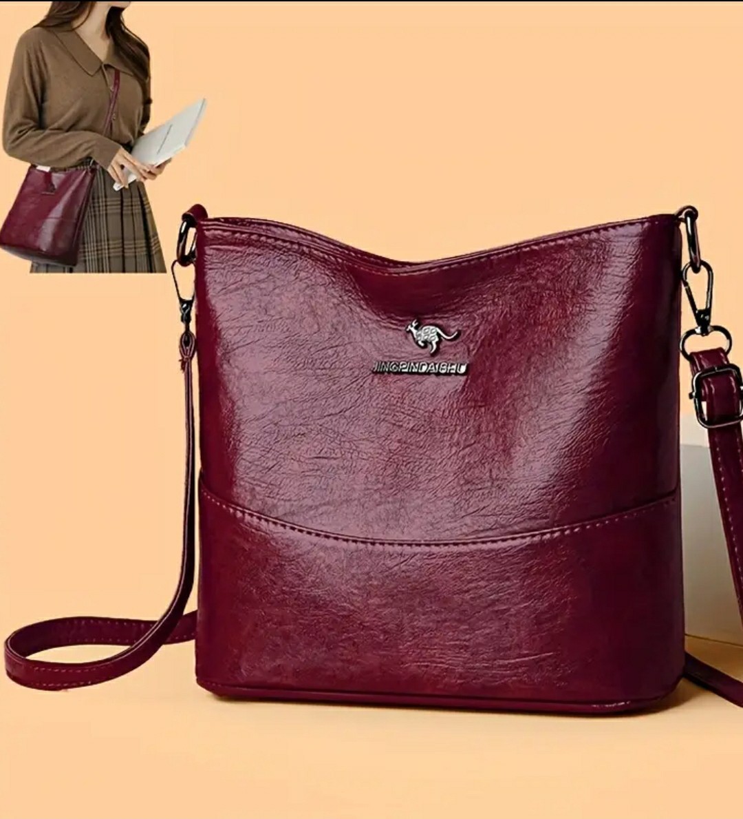 Adjustable Crossbody Bag, Zipper Closure, Stylish City Accessory.