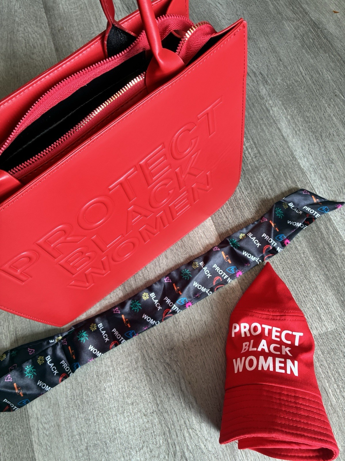 Red “Protect Black Women” Embossed Large Tote Shoulder Bag Zip Top Gold Hardware