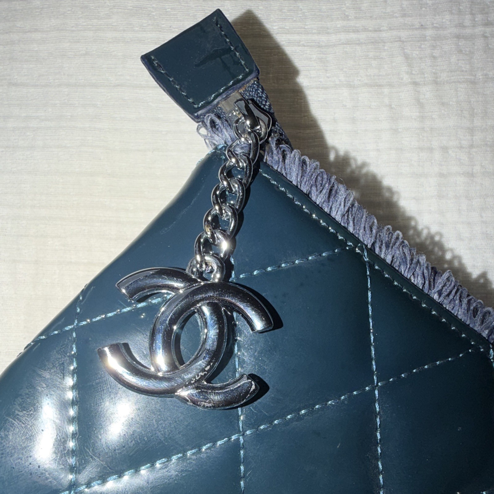 CHANEL Blue Quilted Shoulder Bag Chain Strap Logo Pattern Zip Silver Charm