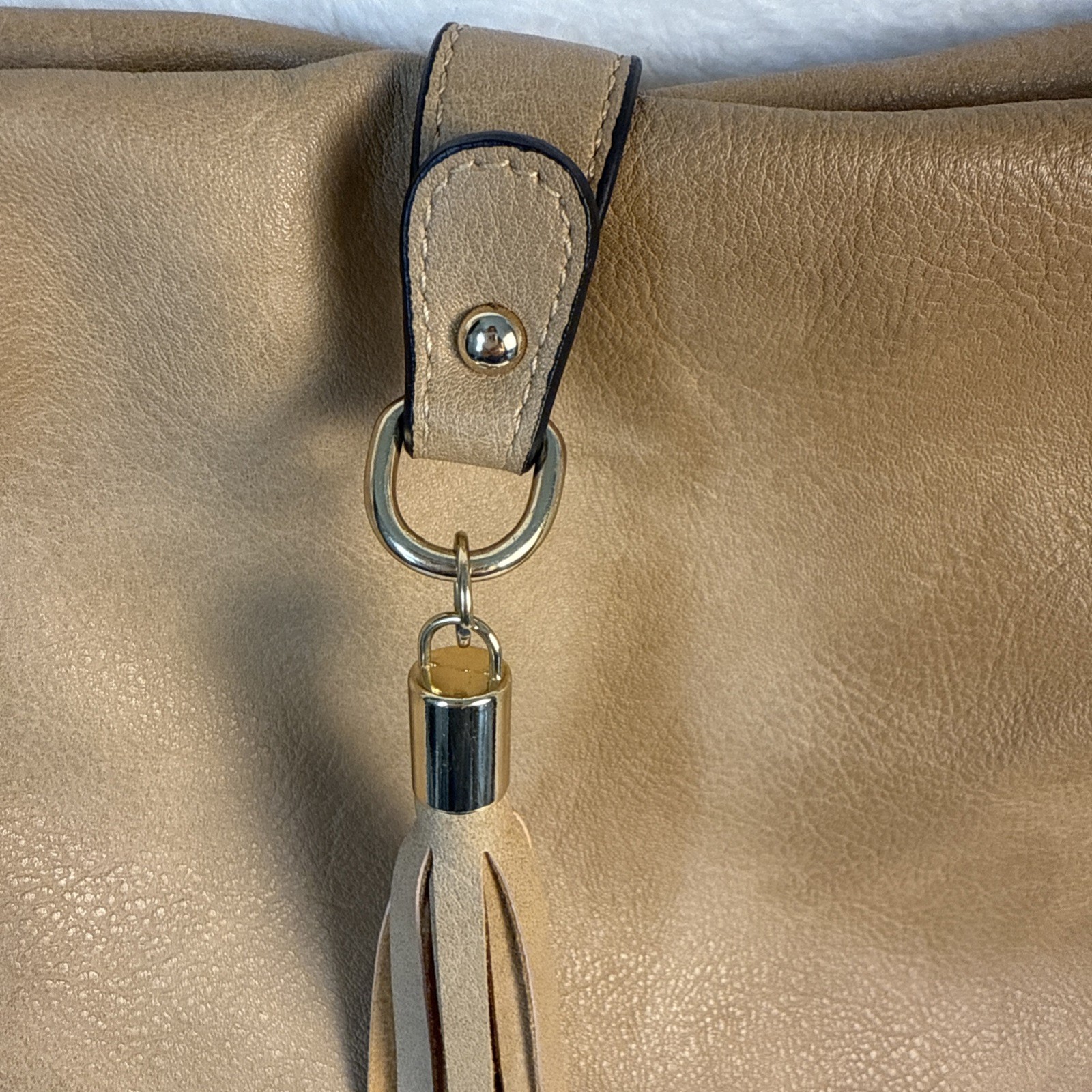 Coco+Carmen Vegan leather bag with gold brads and tassle – cross body